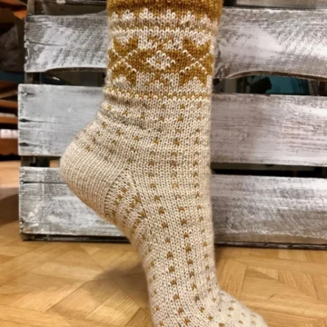 Gullsokken - designet av Merete Norheim.