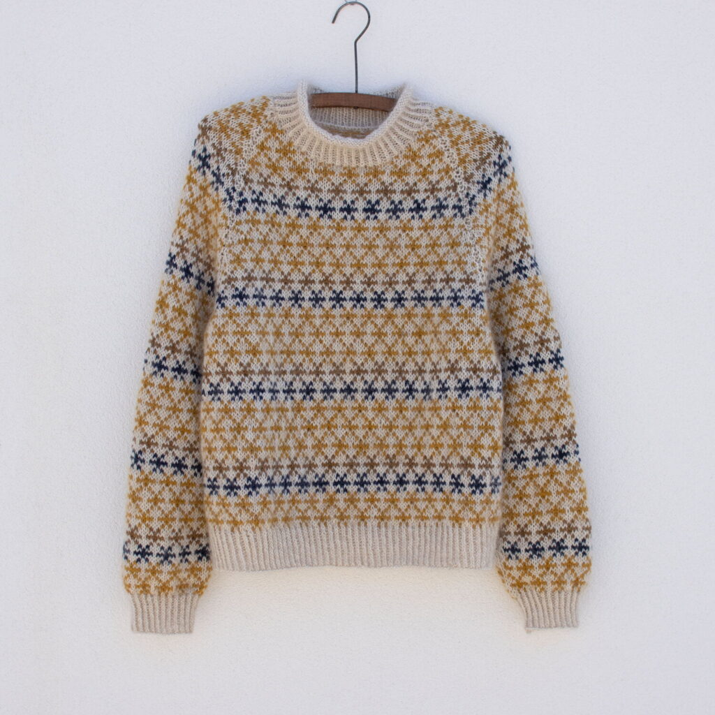 coloured crosses av Anne Ventzel av originalt garnvalg av designeren - garnpakke