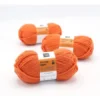 orange garn til strikk Kirkens Bymisjon orangeskjerf