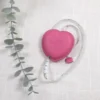 Rullemålebånd Hjerteformet Rosa utrullet