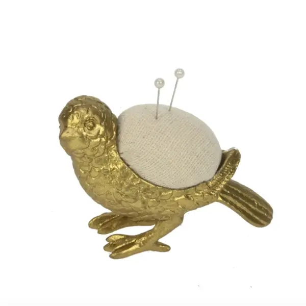 Nålepute med gullfugl