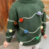 Let's Christmas Sweater available PetiteKnit I Double Sunday fra Sandnes Garn, grønn modell