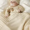 Lang Yarns Skye lue, Rune genser og Loki babyteppe fra Punto 83 Baby Cotton Naturally Colored