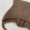Lillebjørnhue fra Knitting for Olive, strikket i Merino og Soft Silk Mohair, closeup, forside