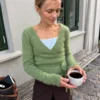 Lucy Wrap av PetiteKnit, omslagsjakke strikket i dobbel tråd silk mohair.